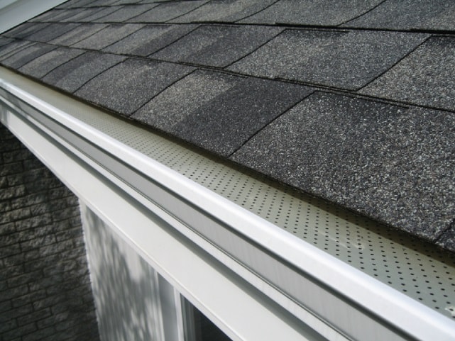 Gutter profile and support detail on a completed home exterior